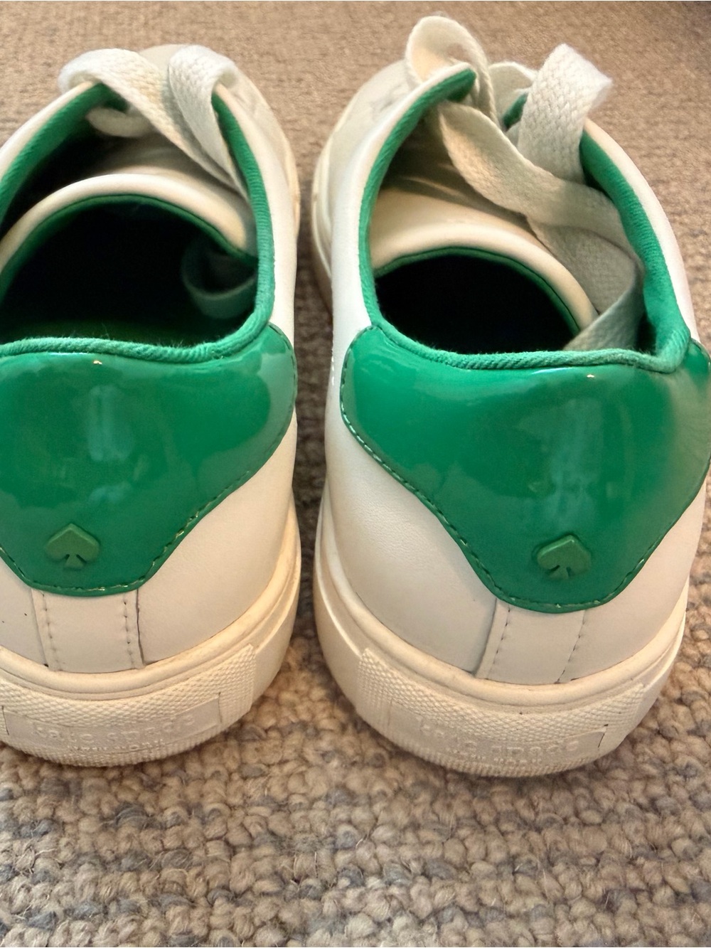 Kate Spade women’s White Sneakers with Green Heel Accent